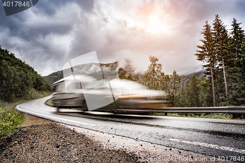 Image of Caravan car trailer travels on the highway.