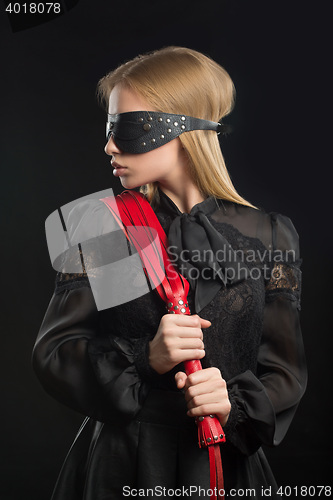 Image of Portrait of young beautiful woman in blindfold