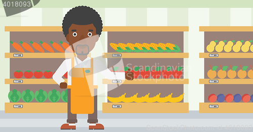 Image of Friendly supermarket worker vector illustration.