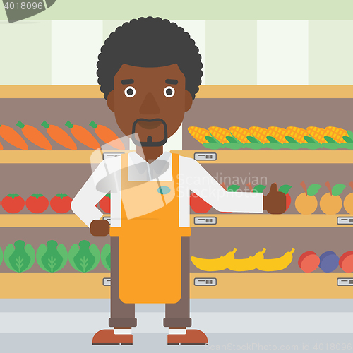 Image of Friendly supermarket worker vector illustration.
