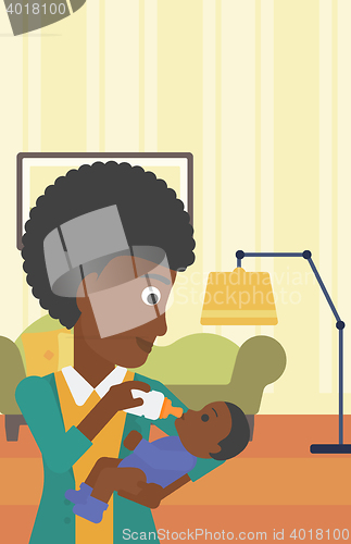 Image of Mother feeding baby.