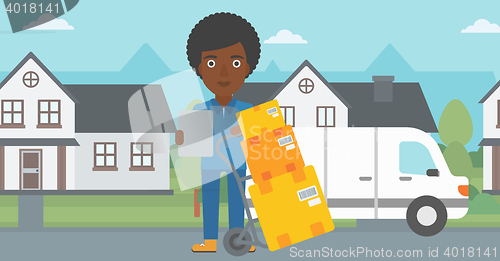 Image of Delivery woman with cardboard boxes.