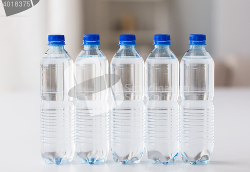 Image of close up of plastic bottles with drinking water