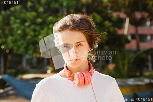 Image of Woman walking on the beach