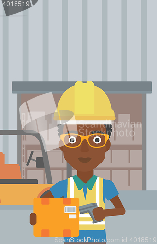 Image of Warehouse worker scanning barcode on box.