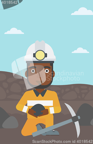 Image of Miner holding coal in hands vector illustration.