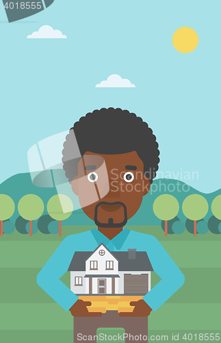 Image of Man holding house model vector illustration.