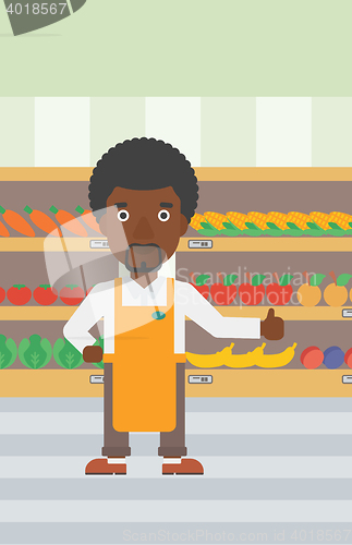 Image of Friendly supermarket worker vector illustration.