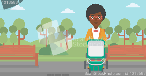 Image of Mother walking with baby stroller.