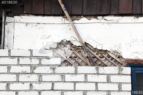 Image of collapsing building, close-up