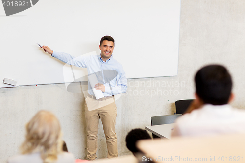 Image of group of students and teacher on lecture