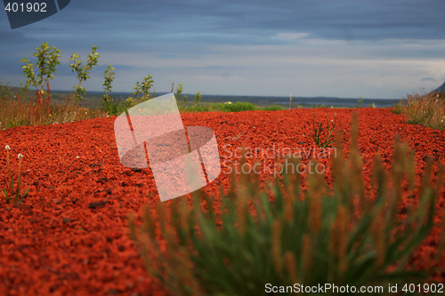 Image of red gravel road