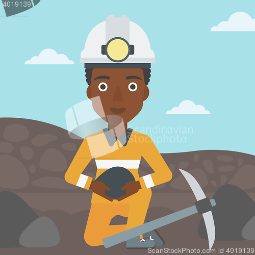 Image of Miner holding coal in hands vector illustration.