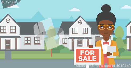 Image of Real estate agent offering house.