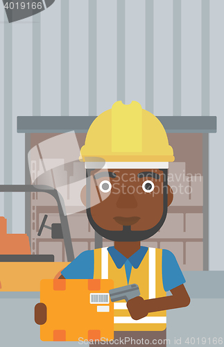 Image of Warehouse worker scanning barcode on box.