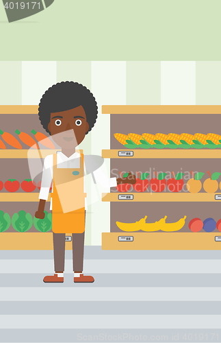 Image of Friendly supermarket worker vector illustration.