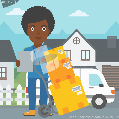 Image of Delivery woman with cardboard boxes.