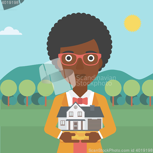 Image of Woman holding house model vector illustration.