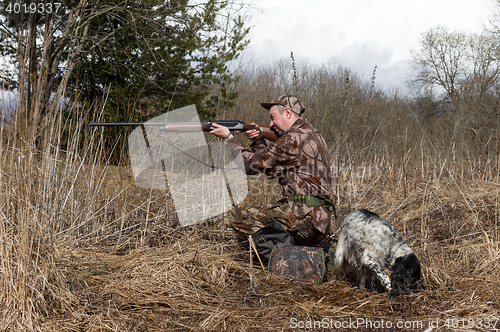 Image of Hunter with a dog