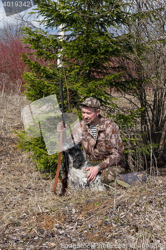 Image of Hunter with a dog