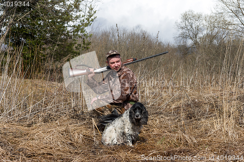 Image of Hunter with a dog