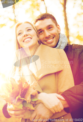 Image of romantic couple in the autumn park