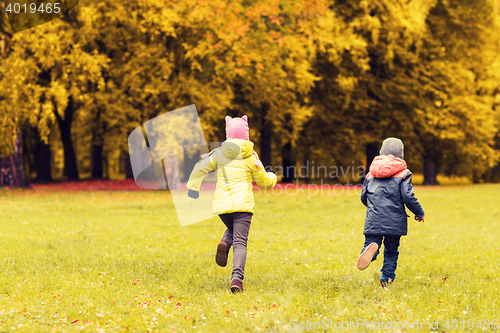 Image of group of happy little kids running outdoors