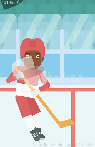 Image of Ice hockey player with stick vector illustration.