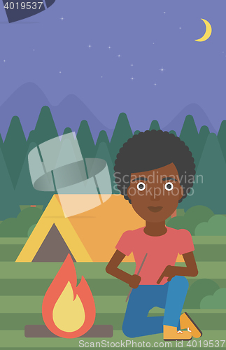 Image of Woman kindling campfire vector illustration.