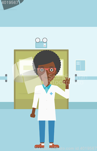 Image of Doctor showing ok sign.