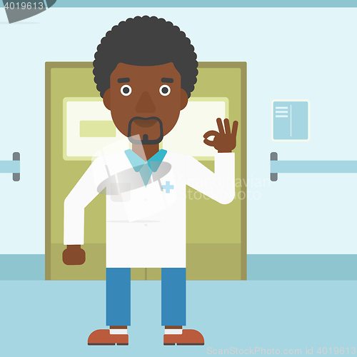 Image of Doctor showing ok sign.