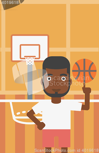 Image of Basketball player spinning ball.