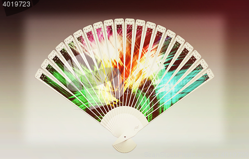 Image of Colorful hand fan . 3D illustration. Vintage style.