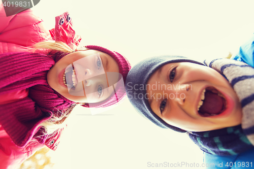 Image of happy boy and girl faces