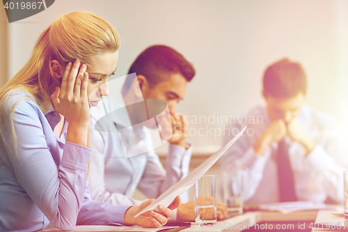 Image of business people having problem in office