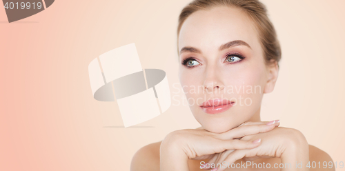 Image of beautiful young woman face and hands