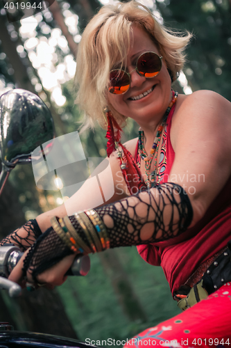 Image of Portrait of Mature Woman Biker