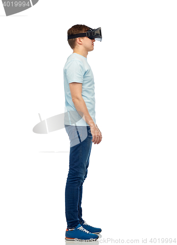 Image of happy man in virtual reality headset or 3d glasses
