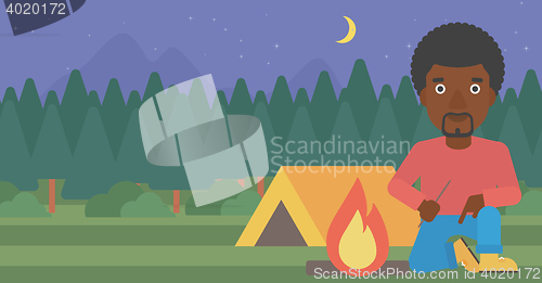 Image of Man kindling campfire vector illustration.