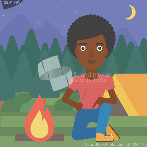 Image of Woman kindling campfire vector illustration.
