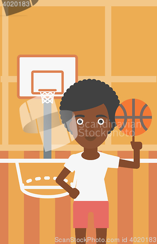 Image of Basketball player spinning ball.