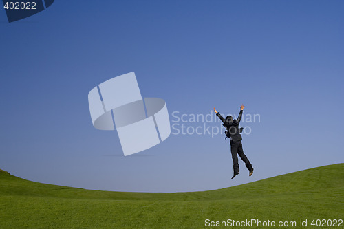 Image of jumping high on the green