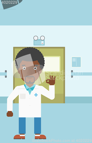 Image of Doctor showing ok sign.
