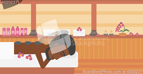 Image of Man getting stone therapy vector illustration.
