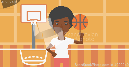 Image of Basketball player spinning ball.