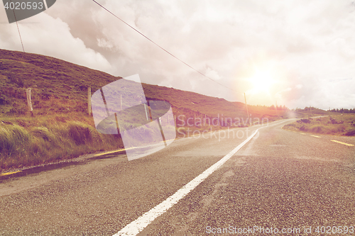 Image of asphalt road at connemara in ireland