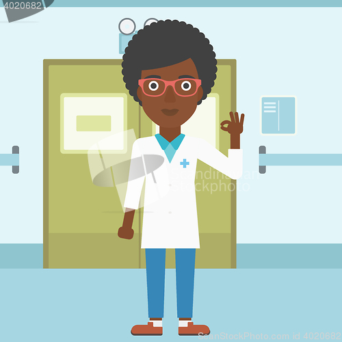 Image of Doctor showing ok sign.