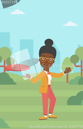 Image of Woman playing flying disc vector illustration.