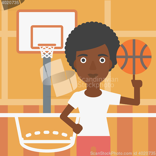 Image of Basketball player spinning ball.