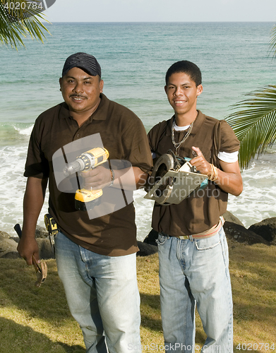 Image of maintenance men workers  hotel resort grounds Big Corn Island Ni